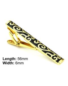 Gold tie clip with Maori pattern