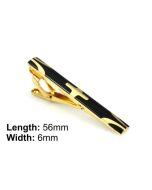 Gold and black tie clip with cross design