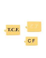 Gold cufflinks with engraved initials