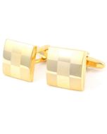 Gold cufflinks with square pattern