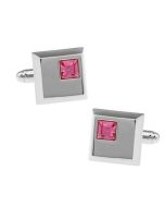 Square cufflinks with a pink crystal inset